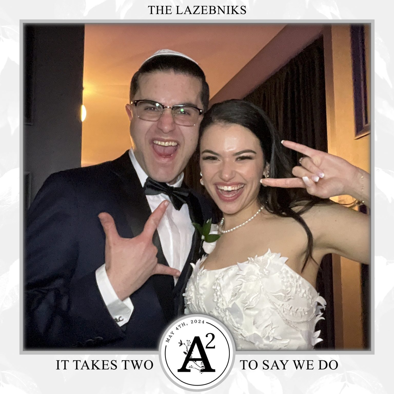 A bride and groom sharing a moment at our photo booth.