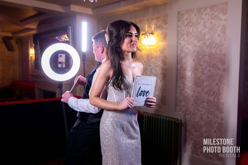 Guests on a 360 photo booth platform at a New Jersey wedding