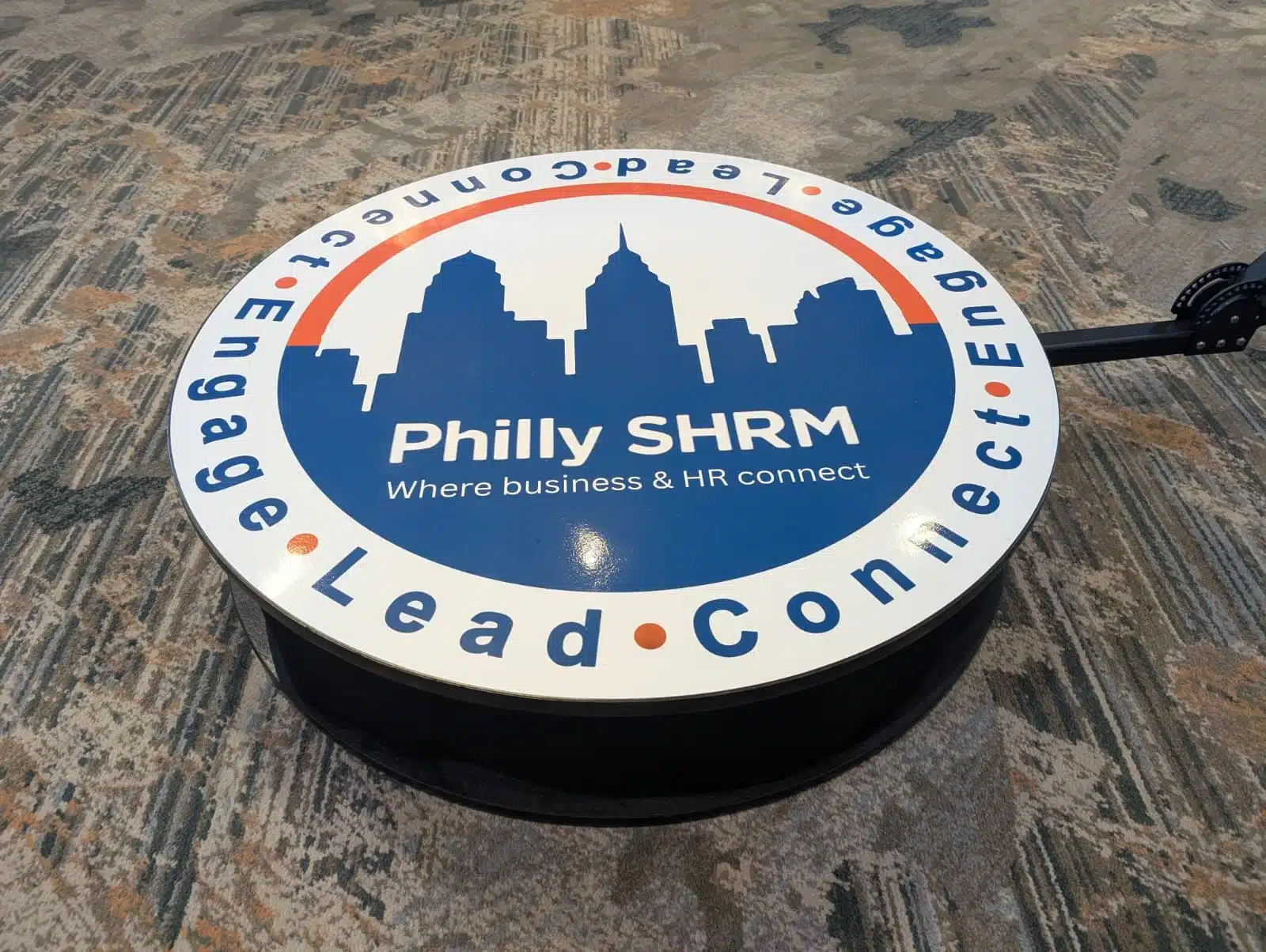Branded 360 video booth platform featuring Philly SHRM logo for corporate event lead generation and HR conference engagement